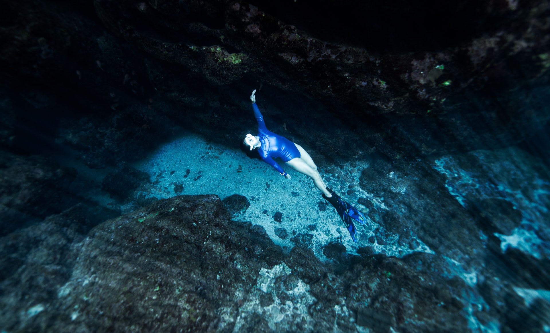 Woman swimming underwater