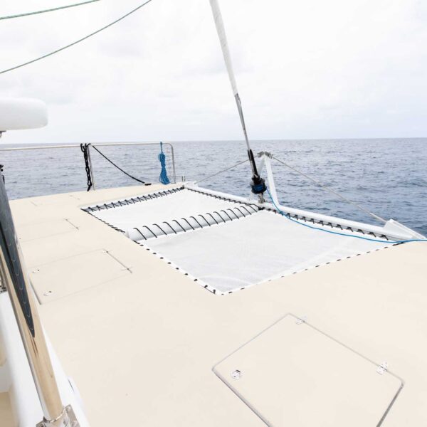 Hoku Nui bow trampoline — relax on the nets on snorkel tours Kona and manta ray tours, sailing Kona coast, Sea Paradise seaparadise.com