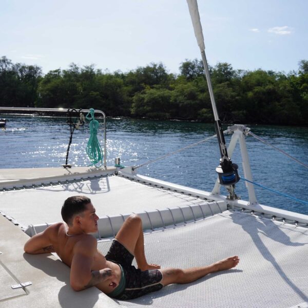Relax on the Hoku Nui bow — snorkel tours Kona and manta ray tours with room to unwind between stops, sailing Kona coast, seaparadise.com